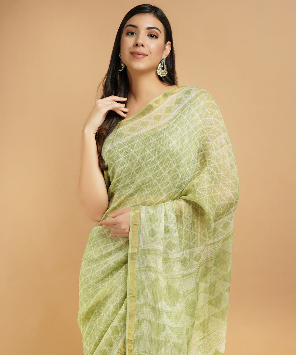 Lime green silk handblock dabu print sari