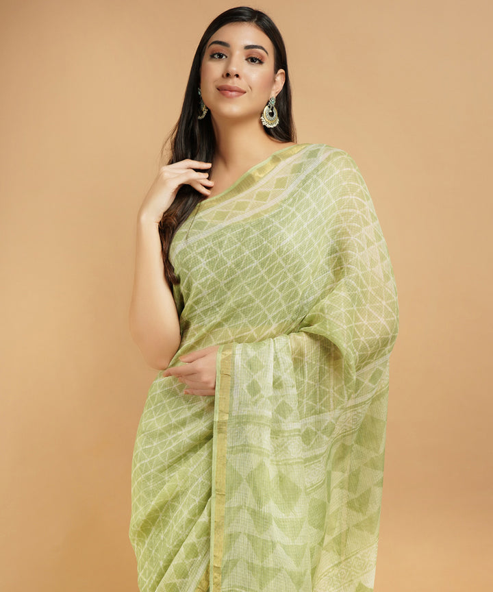 Lime green silk handblock dabu print sari
