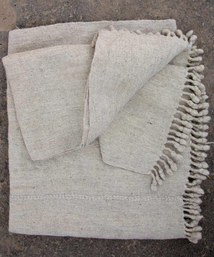 White handwoven woolen blanket