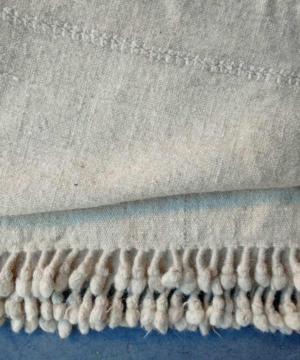 White handwoven woolen blanket