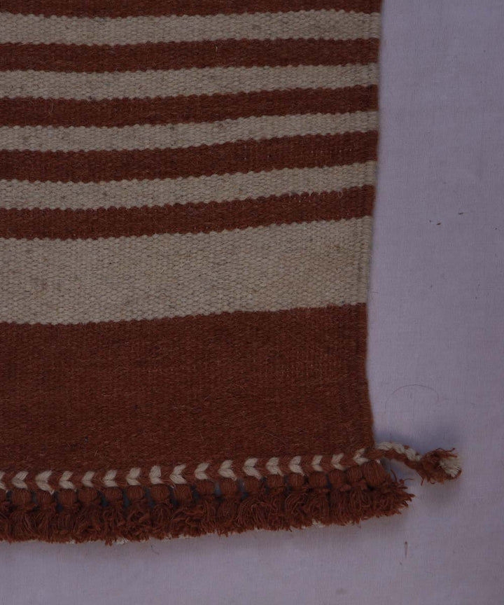 Maroon off white handwoven woolen carpet