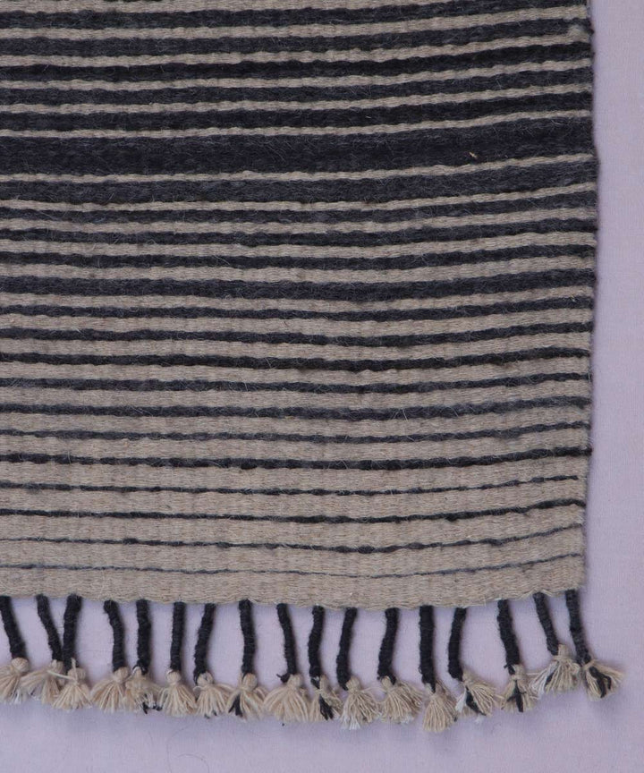 Black white handwoven woolen carpet