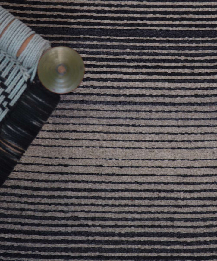 Black white handwoven woolen carpet