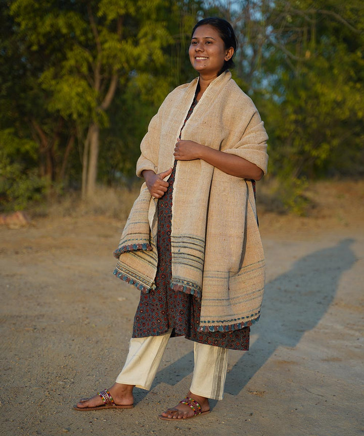 Off white handspun hand woven woolen shawl