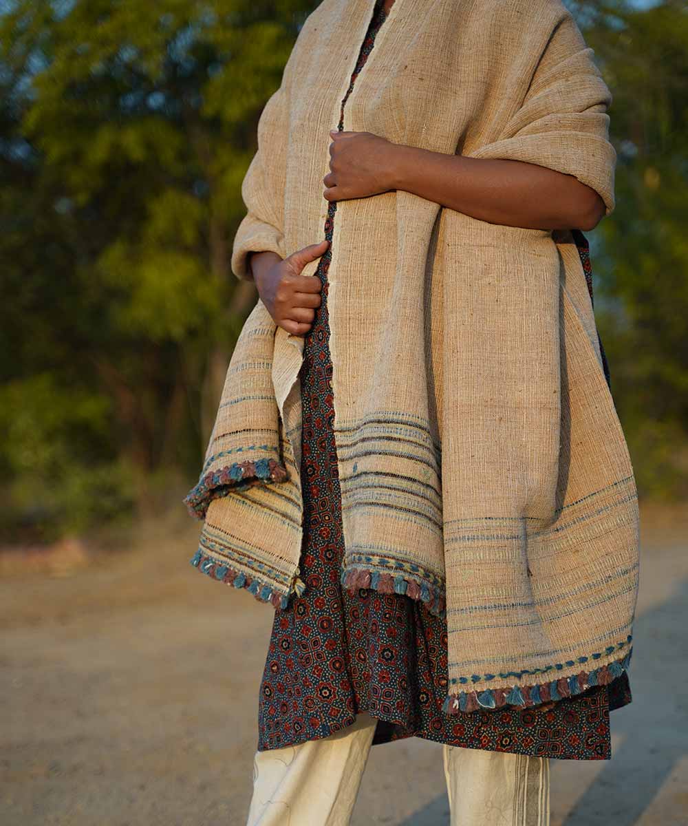 Off white handspun hand woven woolen shawl