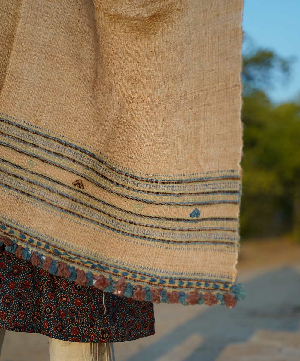 Off white handspun hand woven woolen shawl