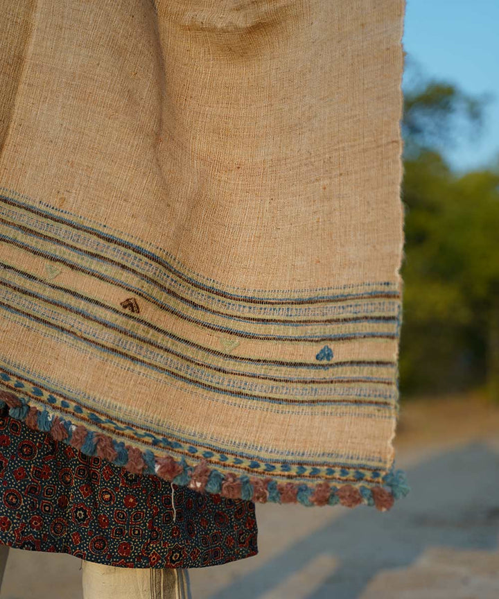 Off white handspun hand woven woolen shawl