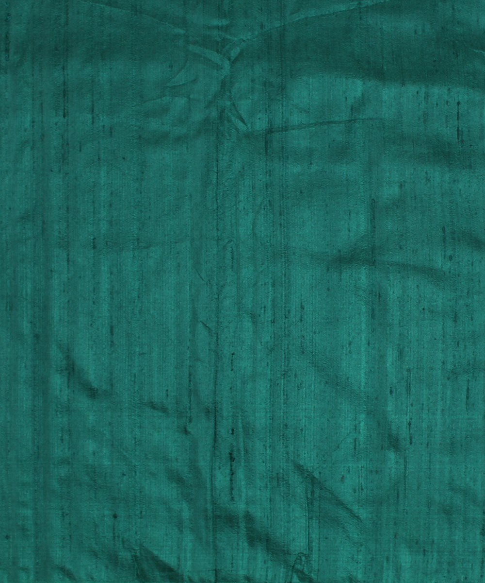 Dual shade dark green handspun handwoven raw silk fabric