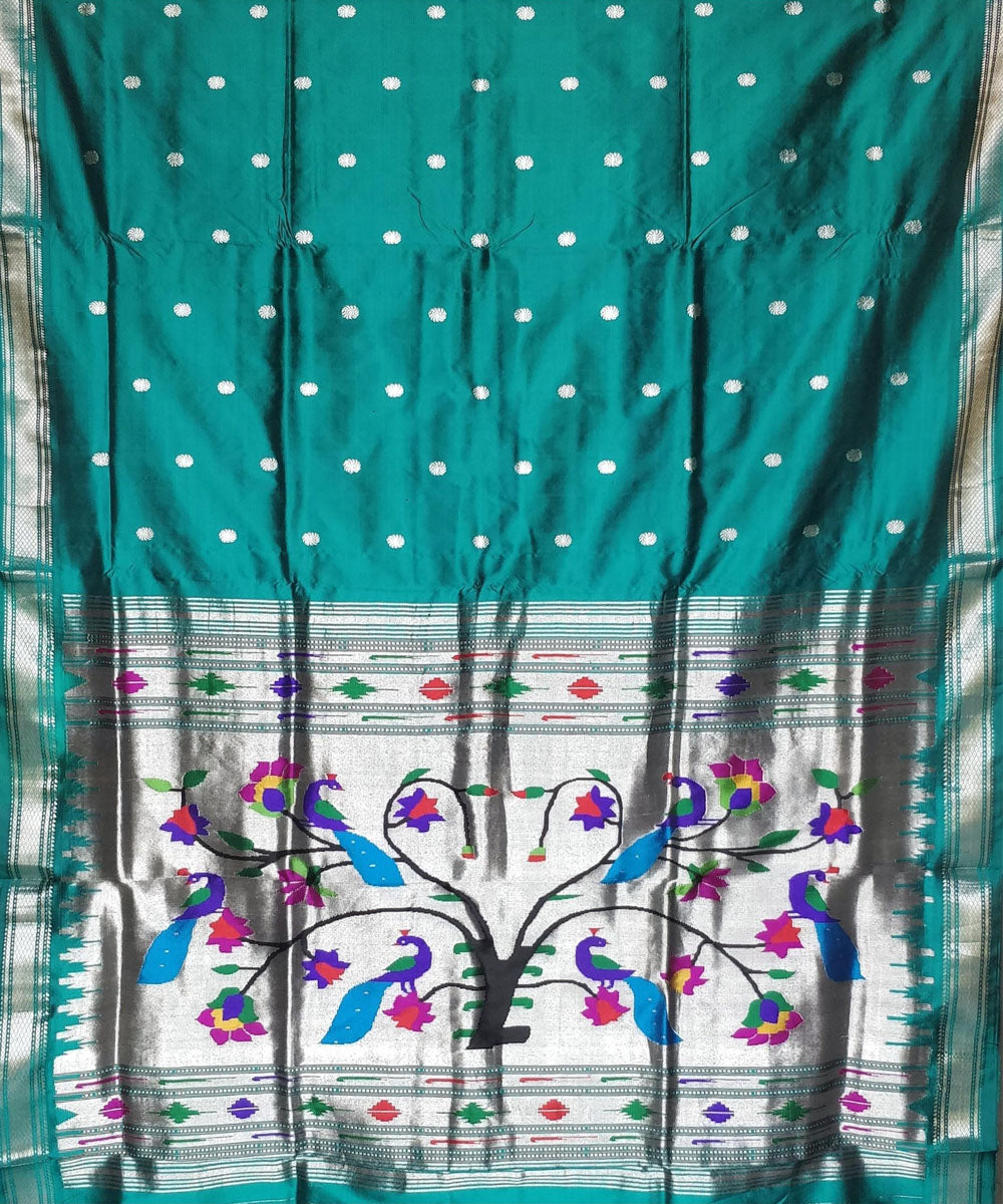 Bottle green silk paithani saree with silver zari flower motifs