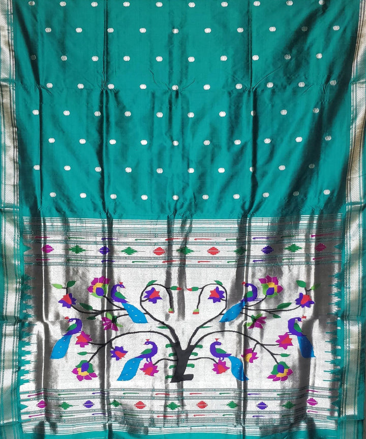 Bottle green silk paithani saree with silver zari flower motifs