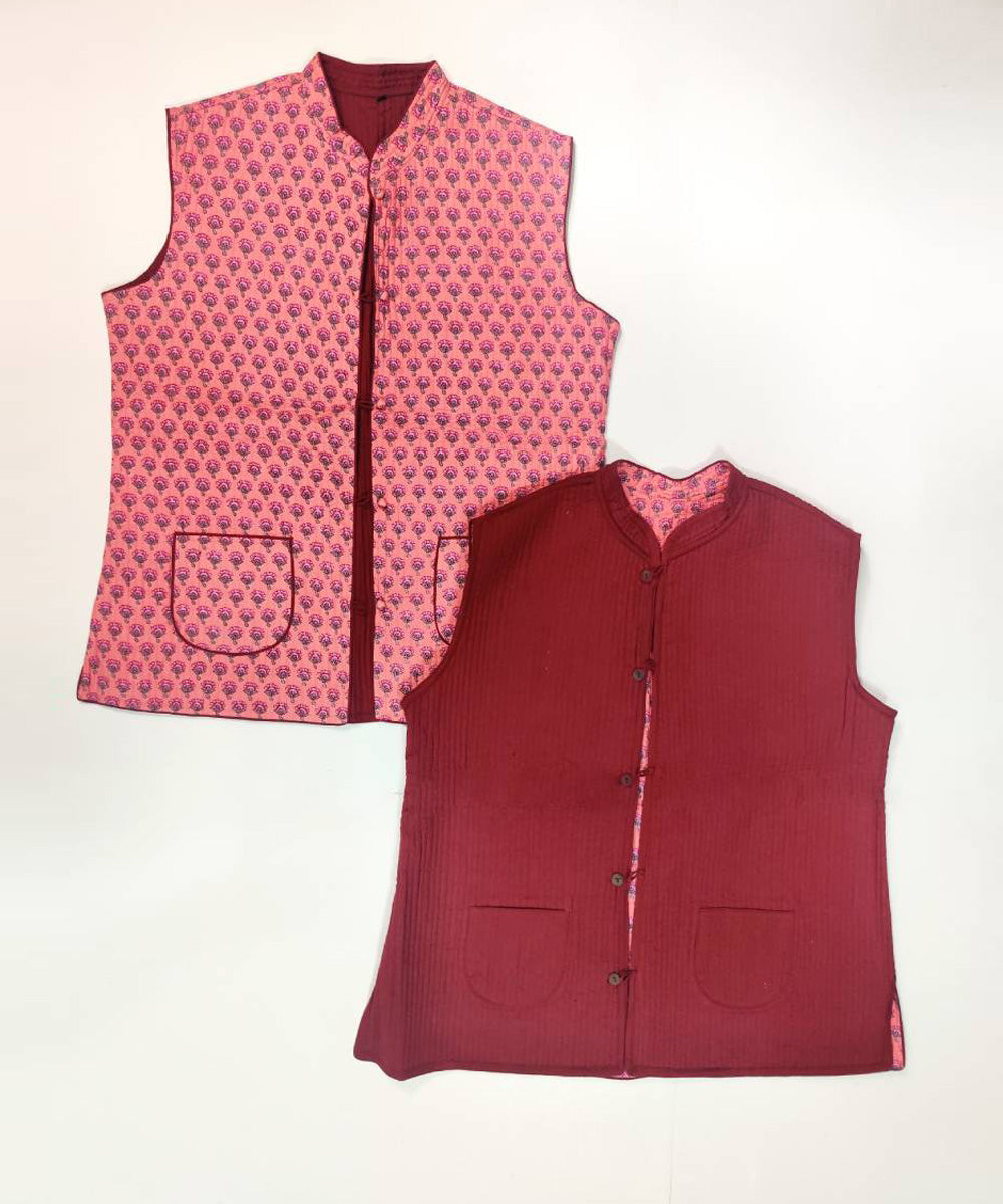 Reddish pink floral printed reversible jacket with cotton quilting