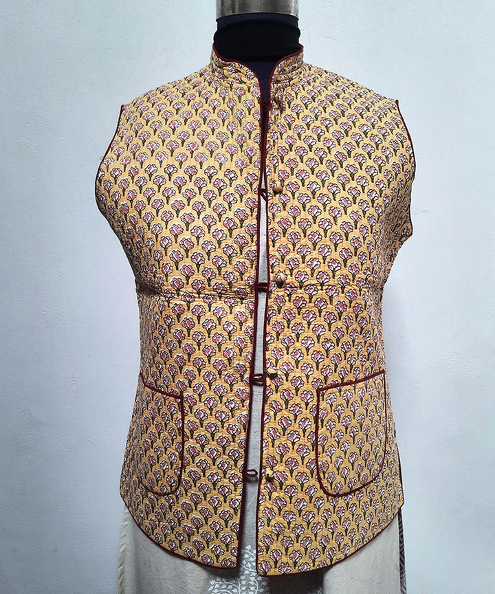 Pastel yellow floral printed reversible jacket with cotton quilting