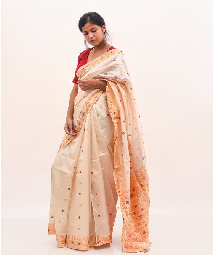 Purbashree beige and yellow handwoven mulberry silk assam saree