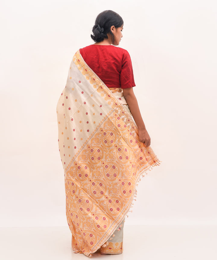 Purbashree beige and yellow handwoven mulberry silk assam saree