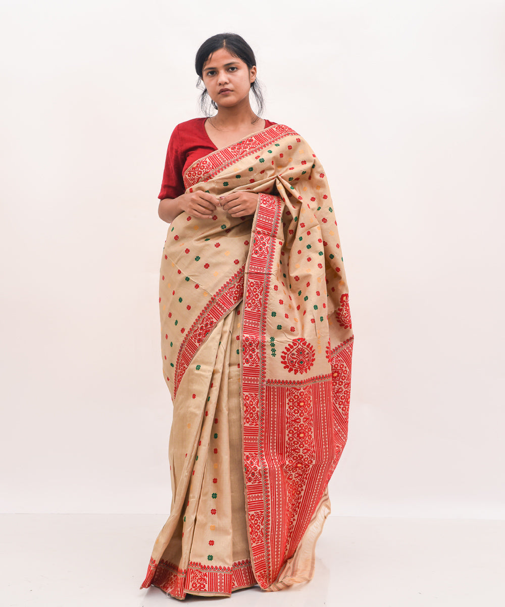 Purbashree beige and red handwoven muga silk assam saree