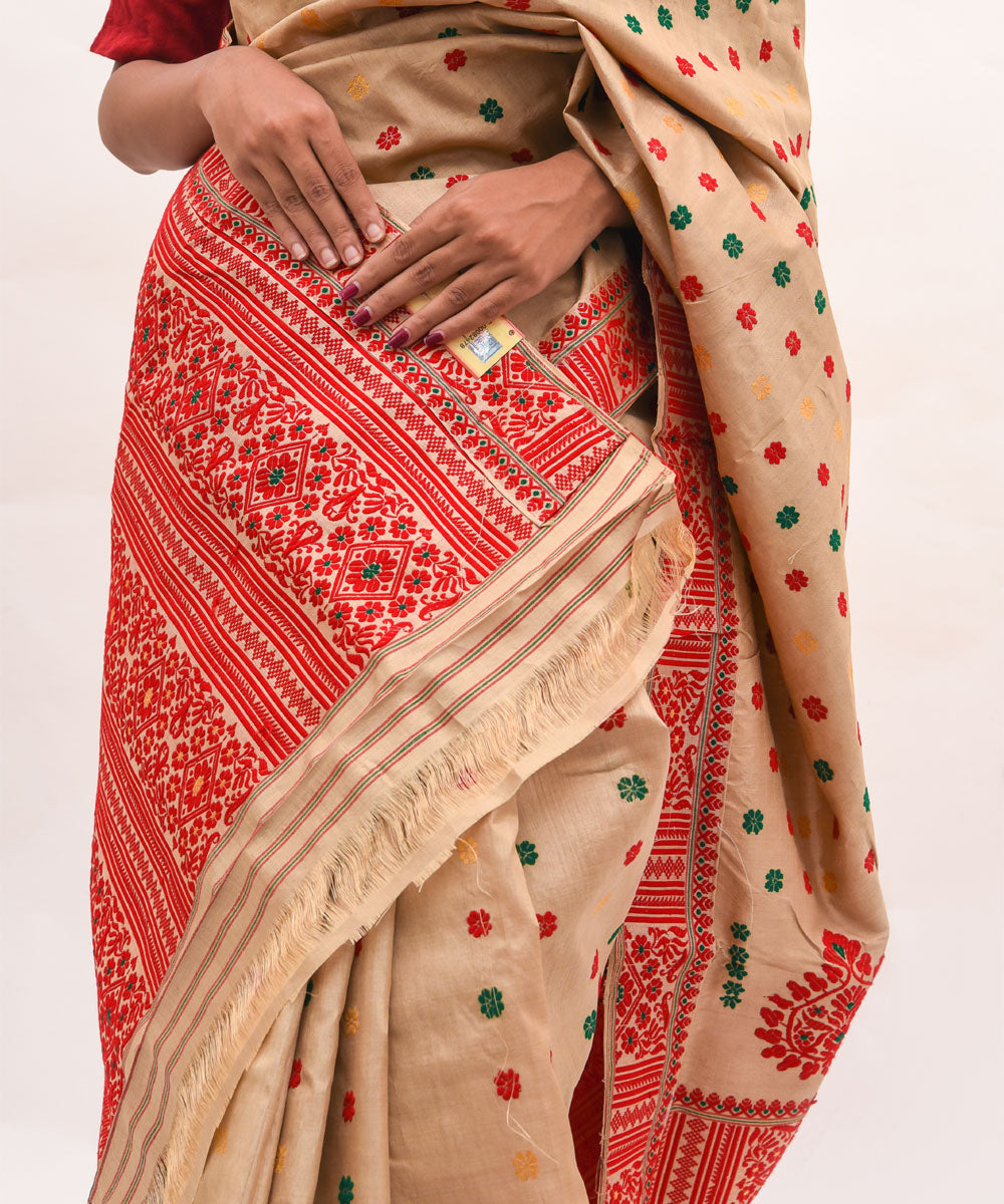 Purbashree beige and red handwoven muga silk assam saree