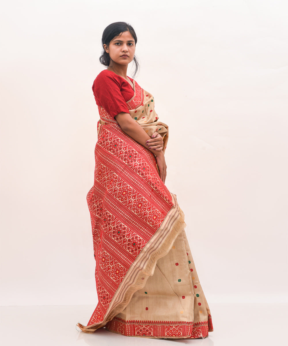 Purbashree beige and red handwoven muga silk assam saree