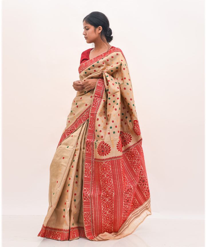 Purbashree beige and red handwoven muga silk assam saree
