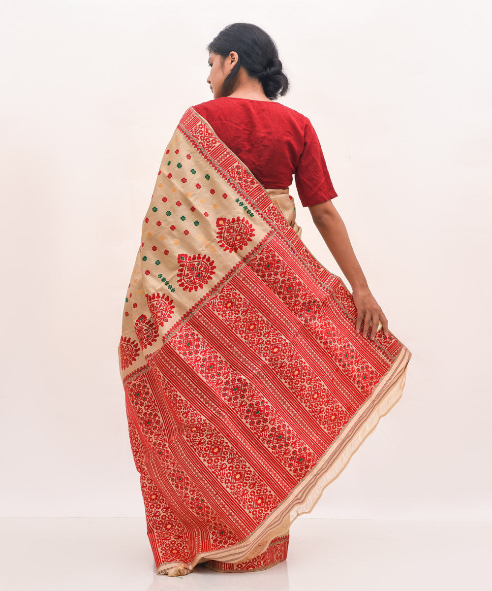 Purbashree beige and red handwoven muga silk assam saree