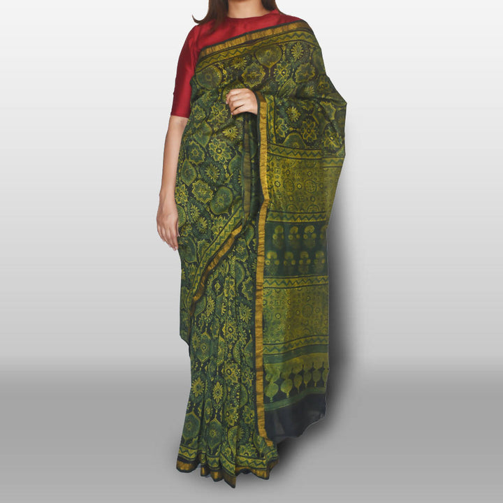 Green ajrakh saree on chanderi with nakshi border