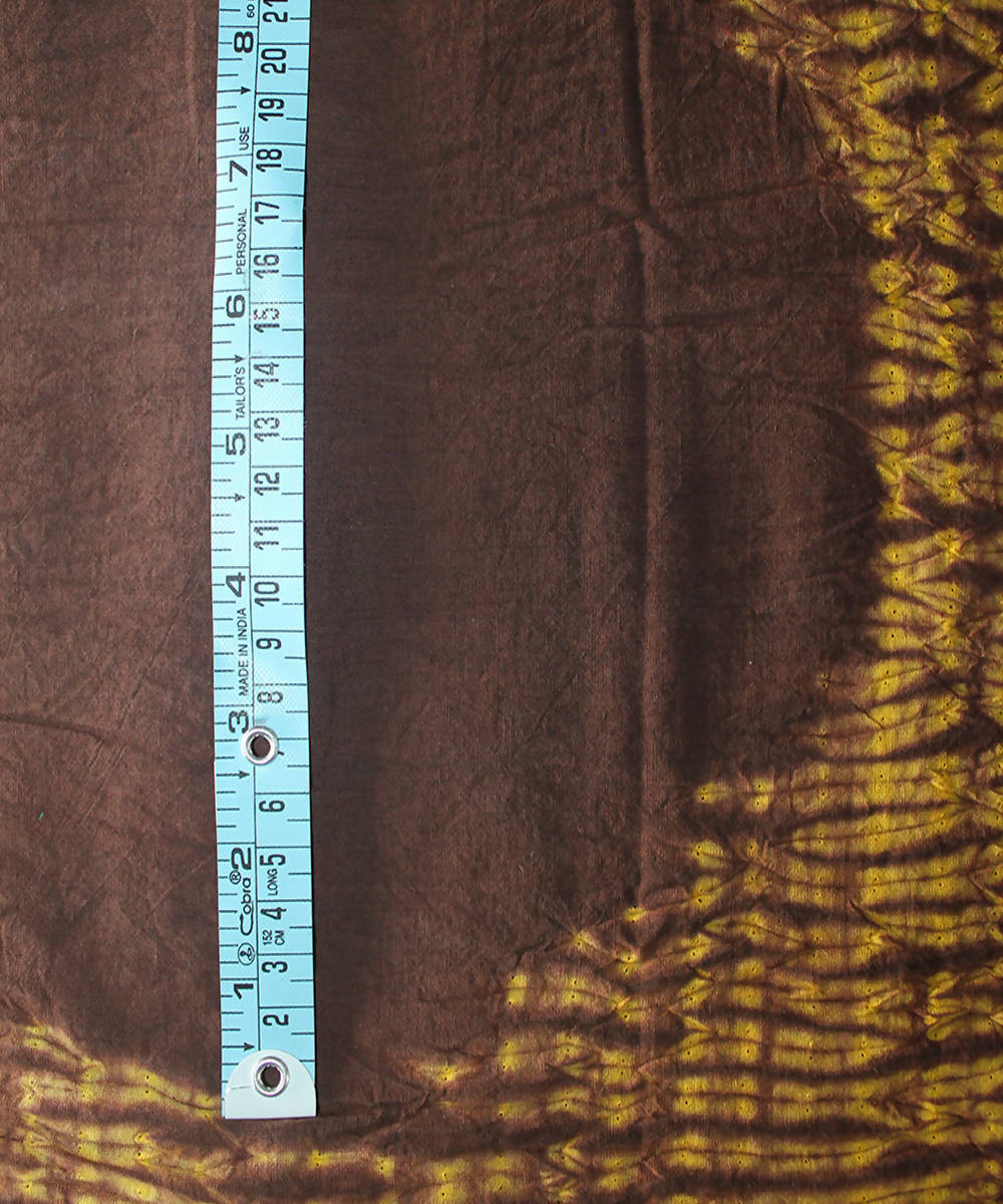 Yellow brown shibori tie dye printed cotton fabric