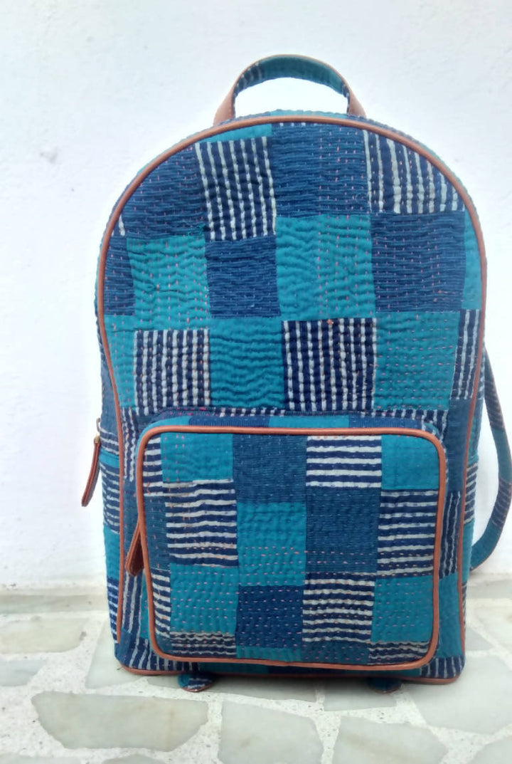 Blue silk leather backpack with tanka embroidery