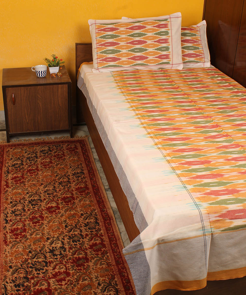 Pale orange cotton handwoven pochampally ikat bedsheet