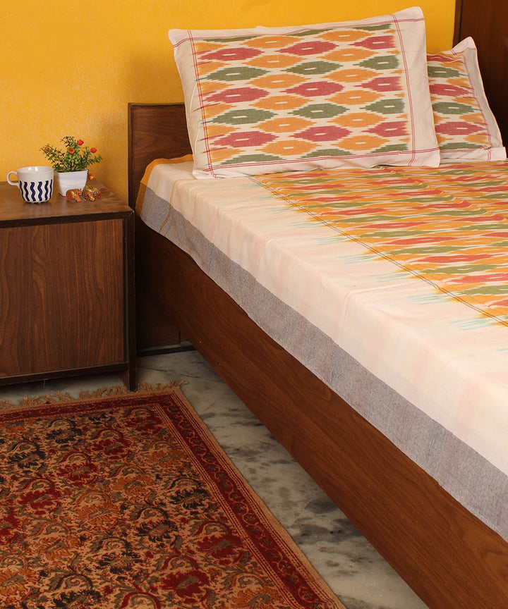 Pale orange cotton handwoven pochampally ikat bedsheet