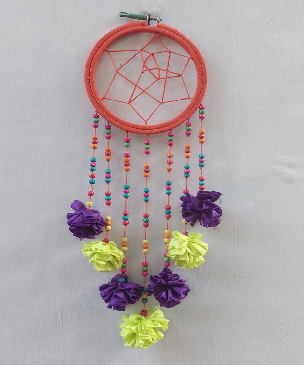 Orange handcrafted wooden dream catcher