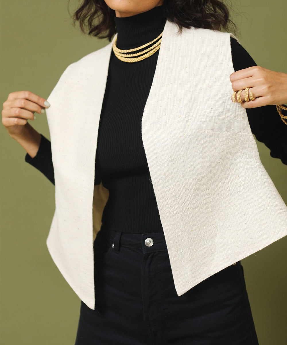 Offwhite handspun handwoven unisex woollen sleeveless jacket