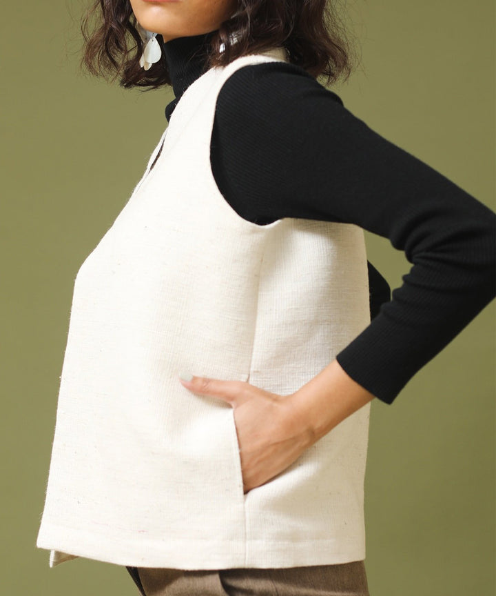 Offwhite handspun and woven unisex woollen sleeveless jackets
