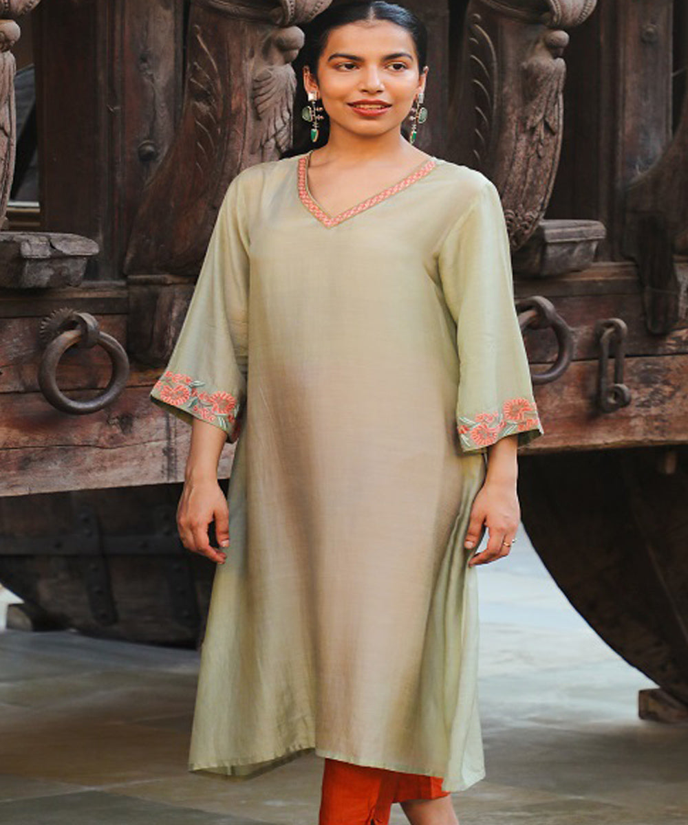 Rangsutra juhi pista green dress with crewel embroidery