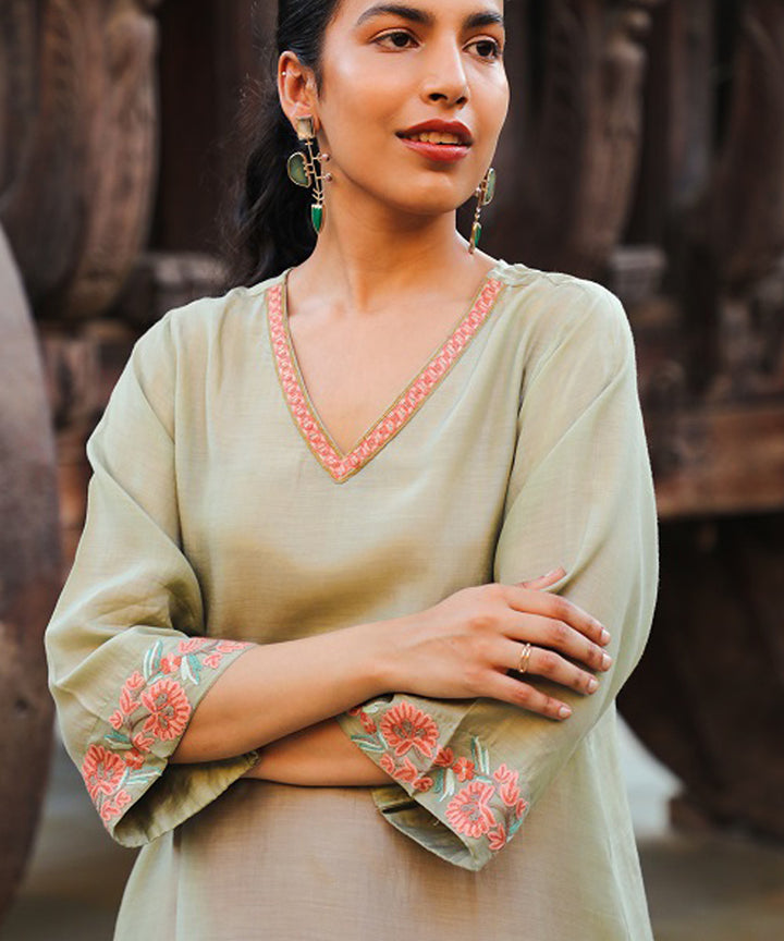 Rangsutra juhi pista green dress with crewel embroidery