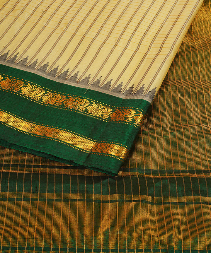 Cream and dark green silk handwoven gadwal saree