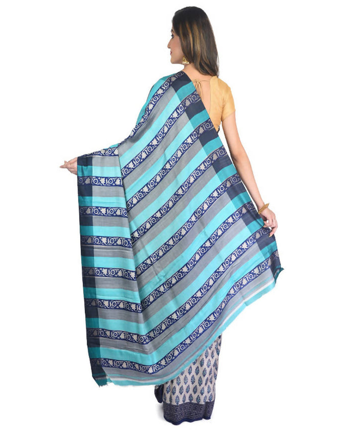 Off white and blue handblock printed eri silk saree