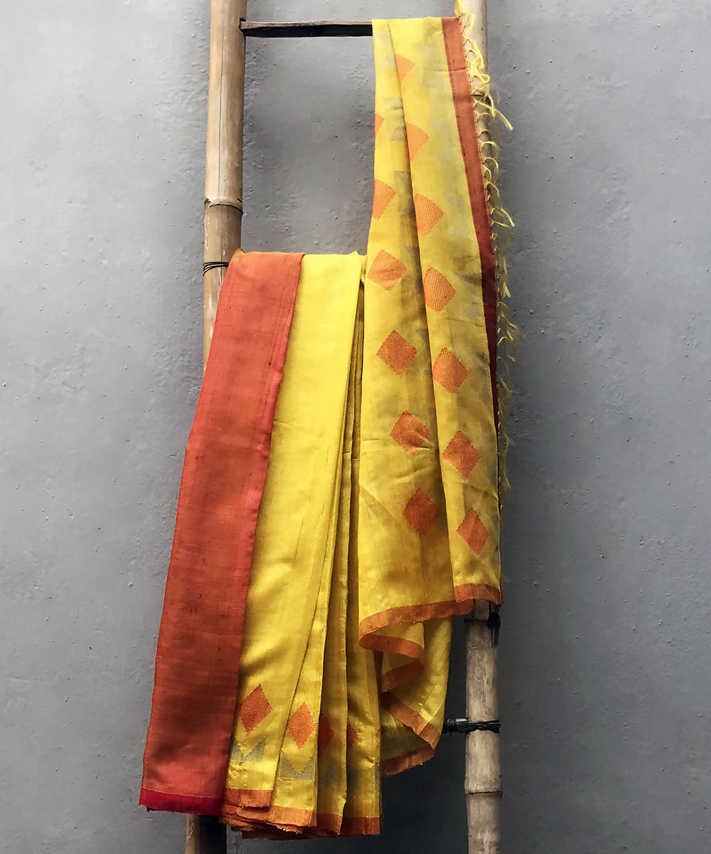 Yellow red handwoven extra weft silk saree