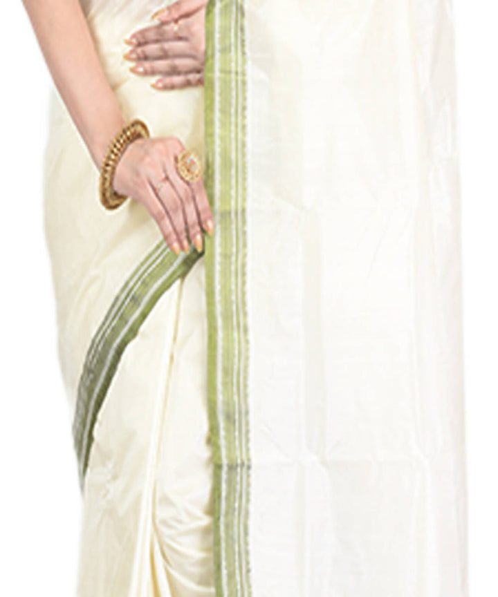 Offwhite with green border handloom garad silk saree