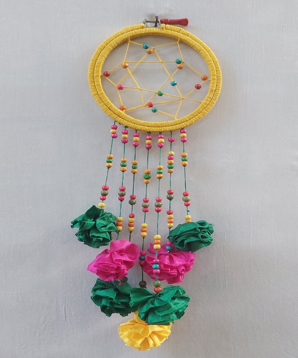 Yellow hand crafted wooden dream catcher